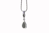 The Essence Charm — Midnight Silver