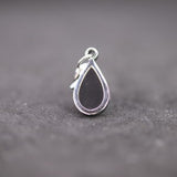 The Essence Charm — Midnight Silver